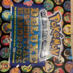 Scholastic Super Deluxe Essential Handbook (Pokémon): The Need-to-Know Stats and Facts on Over 700 Characters