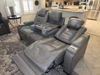 Leather power reclining theater sofa