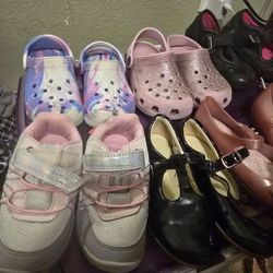 Size 10 various shoes including Reebok Nike and Crocs and therafit