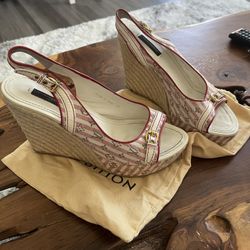 Red LOUIS VUITTON. Monogram Wedge. Size 39. Worn Not New 