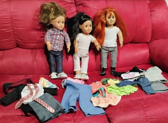 19 in.  Our Generation Dolls with over 20 pieces of clothes