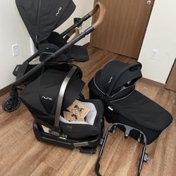 Nuna Stroller and car seat and bassinet 