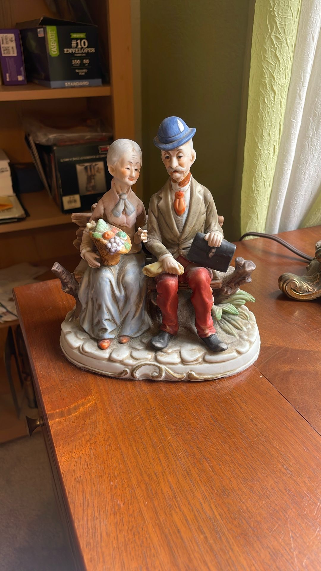 Elderly Porcelain Figure