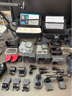 2 of the GoPro Hero9 Black and 1 Hero 5 Touch Screen Wi-Fi camera it comes with everything you see in the pictures,  ( No SD Cards ) all works great