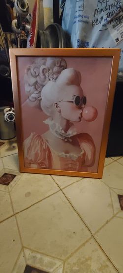 FRAMED LADY BLOWING BUBBLE