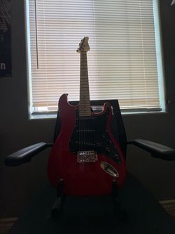 Glarry guitar and stand