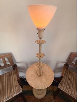 Floor lamp with attached table