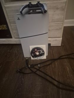 Ps5 slim 1TB digital with cords too and the new ufc 6 the game its self  is brand new