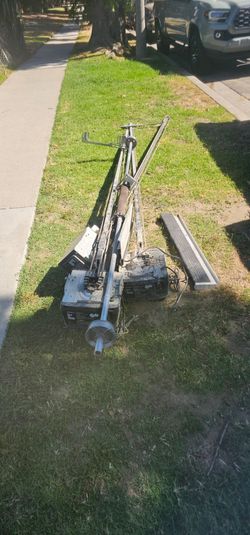 Garage door lifter