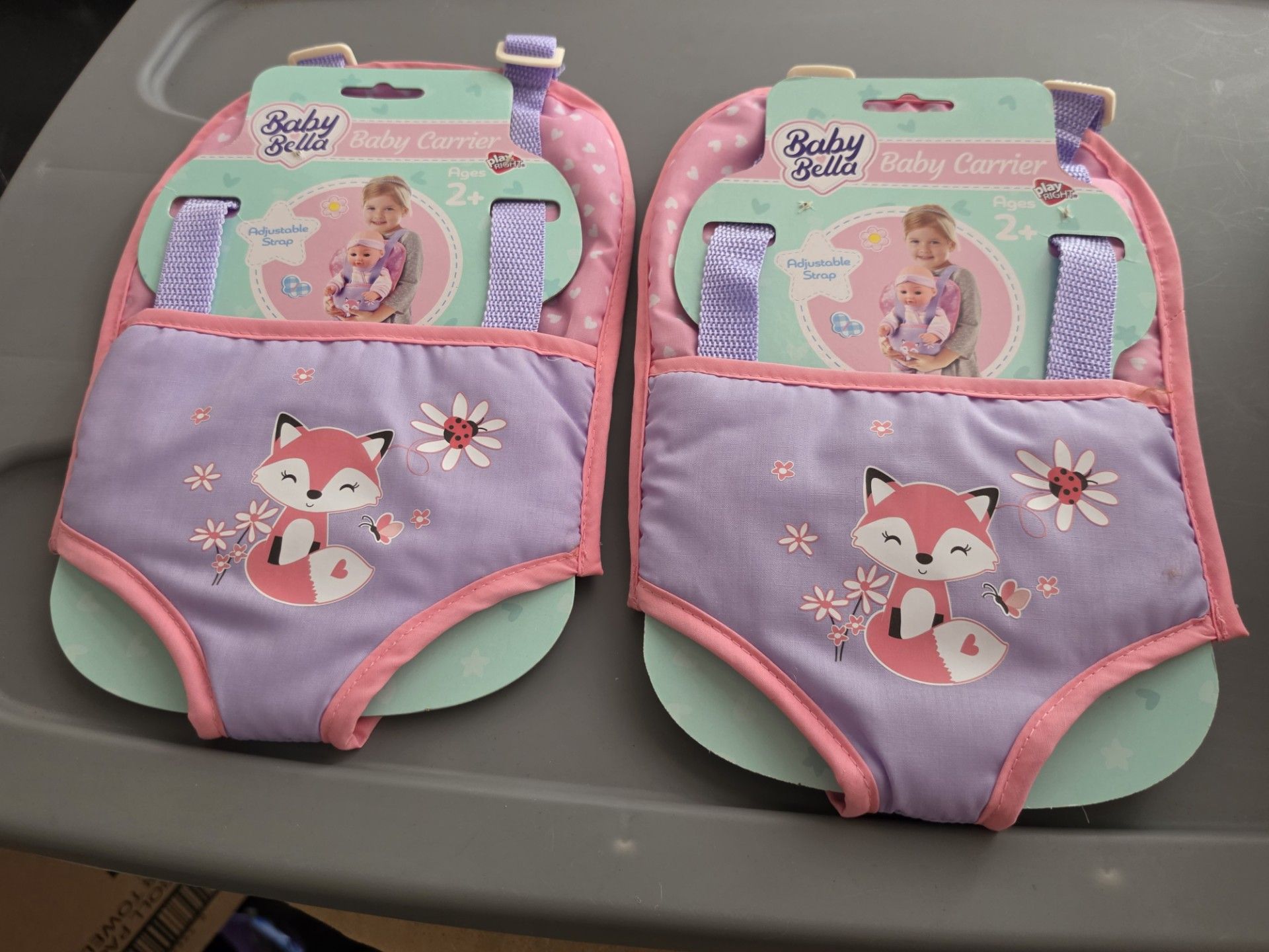 2 baby bella doll carriers