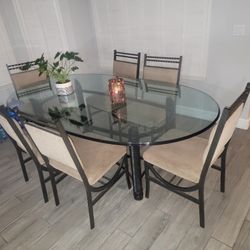 6 Chairs With Beautiful Glass Table