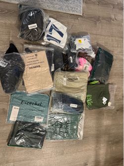Box of new and unopened clothes