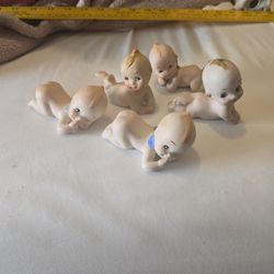 Remember mother's day may 10  baby  figurines, $3 dollars each 