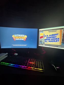 RGB Gaming Keyboard with Dual Monitor Setup
