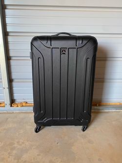 28” black TAG hardside spinner suitcase