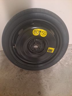 Rubber Floor mats and spare doughnut tire for VW jetta