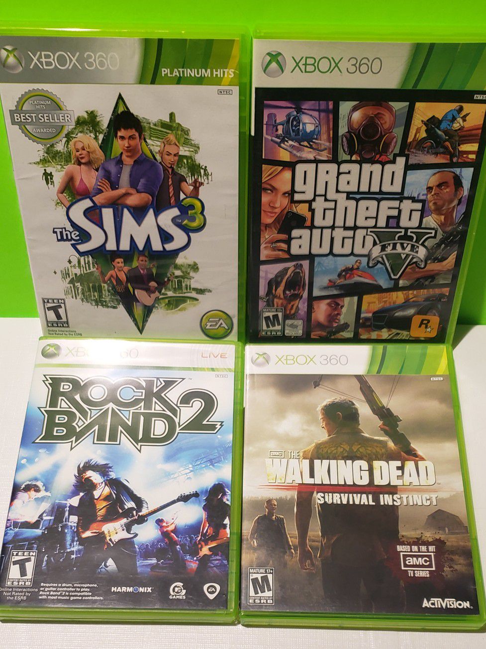 Xbox 360 Game Lot - GTA V + Sims 3 (You get all 4)