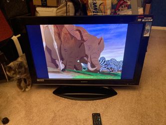 32"sharp tv and dvd combo with remote control - $30