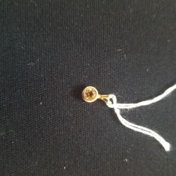 14k Yellow Gold Childs Topaz Pendant 