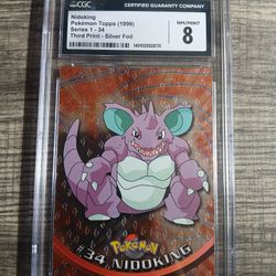 1999 Topps Pokémon Series 1 Nidoking #34 Third Print - Silver Foil card, graded NM/MINT 8 by CGC (Certified Guaranty Company)
