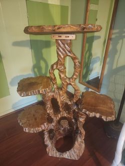 Oakwood plant stand, and carved.