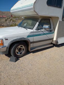 Free.  1995 Dodge truck... (junk) camper..parts...free