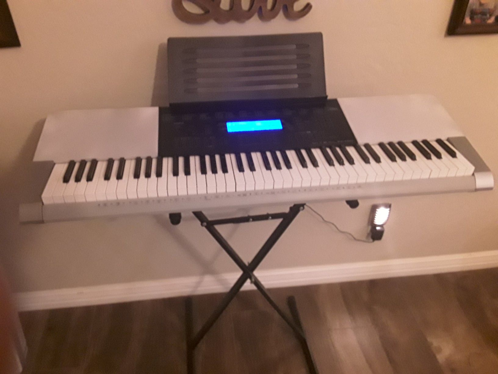 Casio WK-220 76-Key Personal Keyboard with USB Connection and 152 Songs + Stand + Ac Adapter
