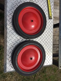 Pair of. Vintage 12" pedal car wheels and tires