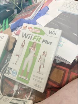 Wii fit plus and Wii fit books discus and cases