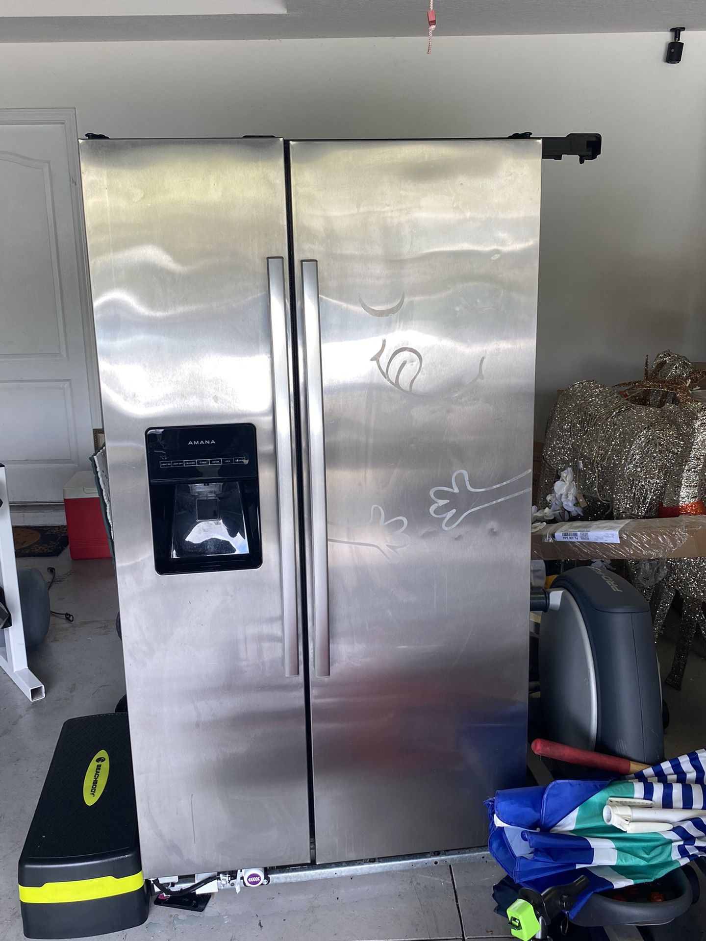 Amana Brand Few years old works great stainless steel refrigerator w/ ice maker and water