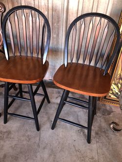 2 Wood Swivel Barstools Black Color with Wood Seat. Selling for $60 each but want to sell as a set 41” h x 17” d x 17” w 25” floor to seat Seat to b