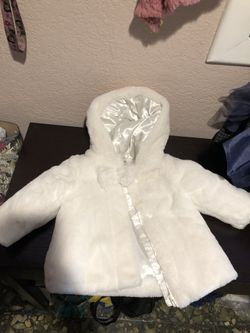 Girls white fluffy coat. 12 months. Lined. Brand new with hood.