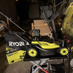 RYOBI ONE+ 18V 13 in. Cordless Battery Walk Behind Push Lawn Mower with 4.0 Ah Battery and Charger