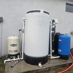 Water Filtration System and Pump for a Well