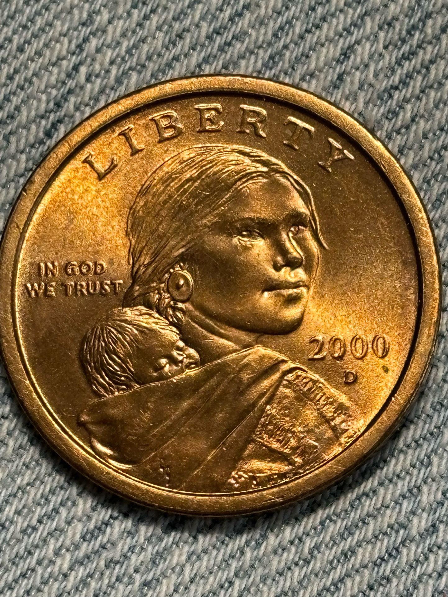 A 2000 P Golden Sacagawea Dollar a deep, beautiful gold color. Please make decent offer.