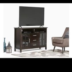Simpli Home Kitchener solid wood contemporary tall TV media stand in a hickory brown finish.
