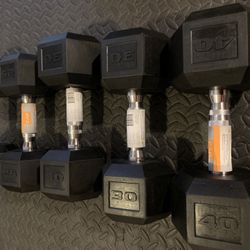DUMBBELL SET: (2) 25 LB, (2) 30 LB, (1) 40 LB ALL NEW