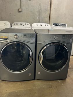 SILVER WHIRLPOOL DUET WASHER AND DRYER