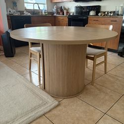 47 Inch Round Dining Table with Storage Fluted Base