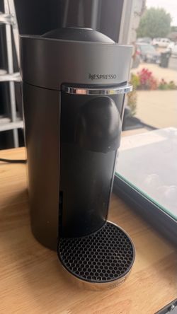Nespresso coffee machine and tray with pods
