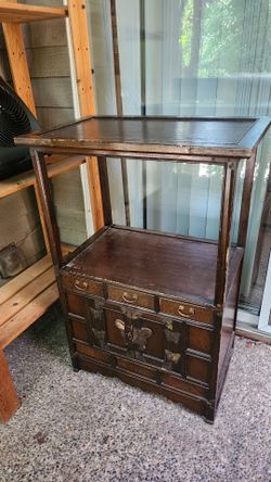 Dark wood cabinet and display shelf
