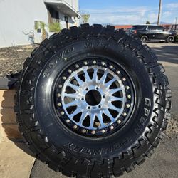17" KMC KM445 IMPACT beadlocks w- 37" Toyo M/T $3900