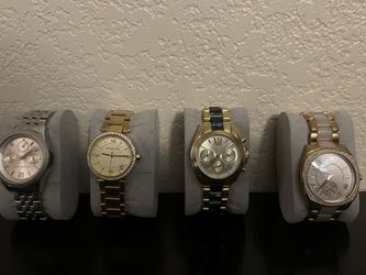 Original michael kors watches $30 each good condition just needs batteries