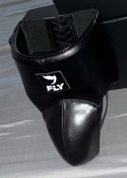 Fly groin guard
