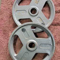 WEIDER. OLYMPIC 2" PLATES TOTAL 70lbs.   2-35s.  
7111.S WESTERN WALGREENS 
$70  CASH ONLY AS IS 