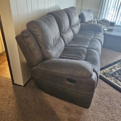 Barely used couch with two recliners