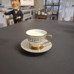 Gold & White Greek Key Design Porcelain Demitasse Cup & Saucer With A Candle Inside The Cup