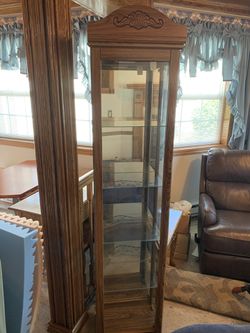 Small Oak look curio cabinet