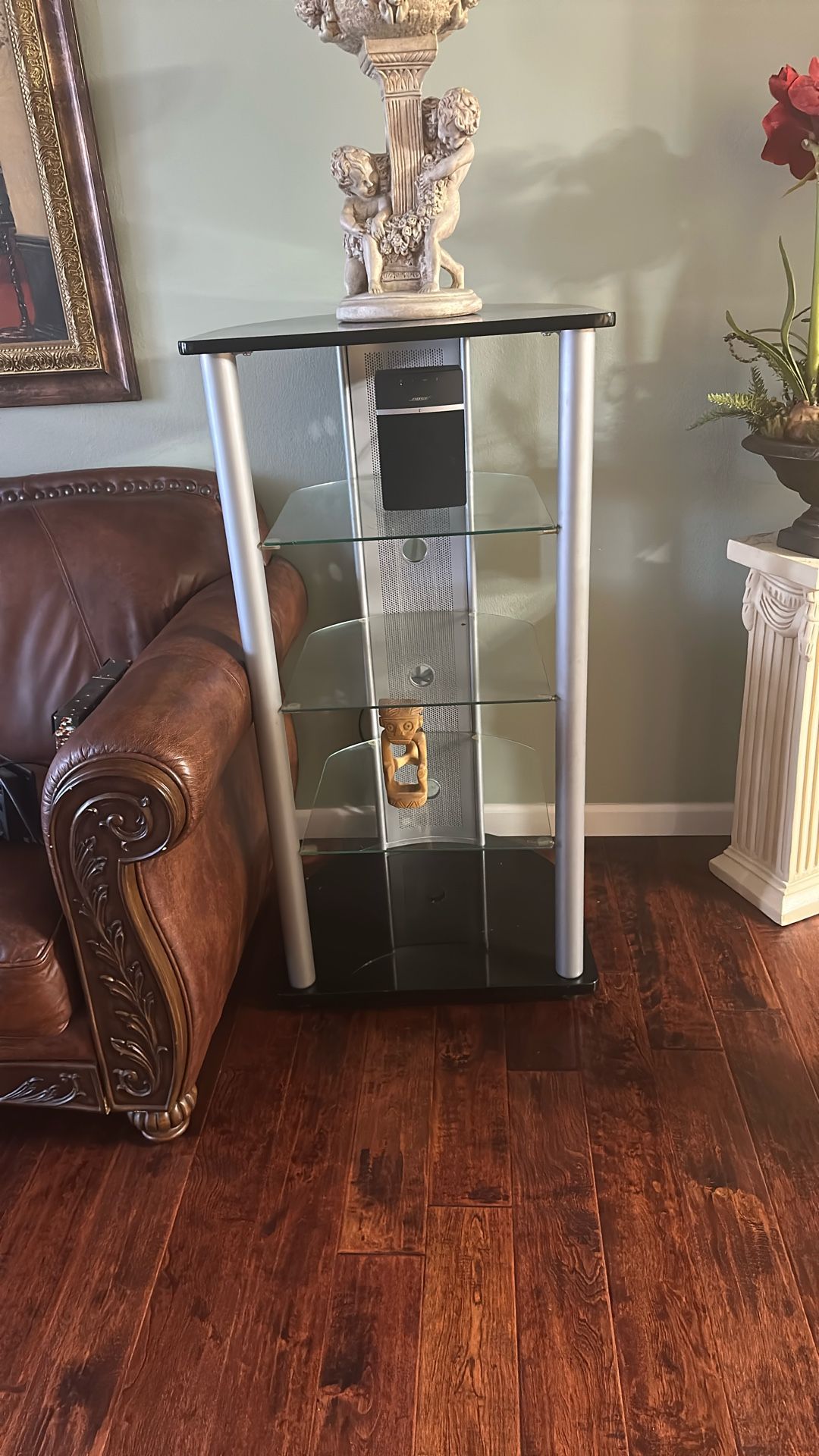 Three-tiered glass tv stand/shelf