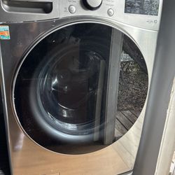 LG Front load washer on a pedestal small washer